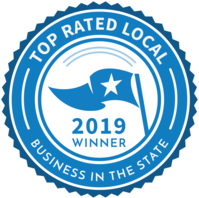 A blue seal with the words " top rated local business in the state."